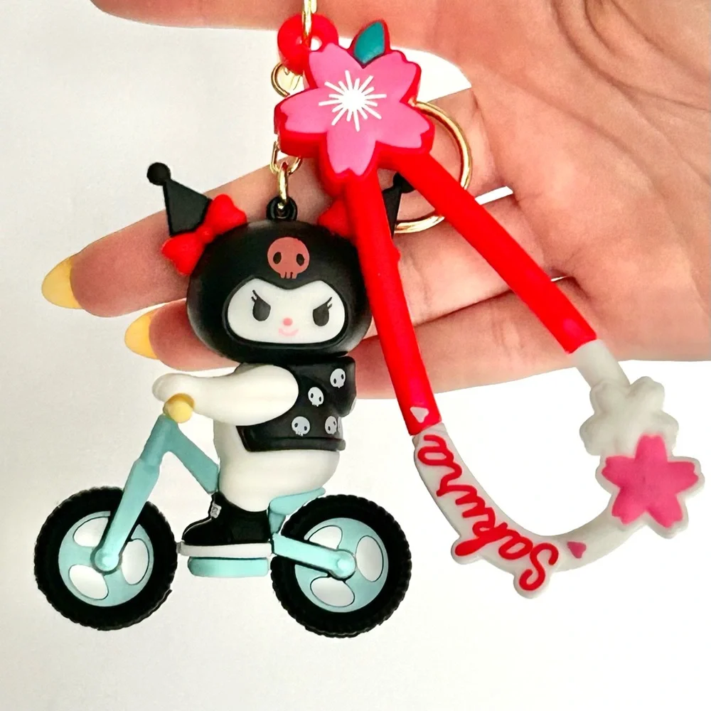 💜Kuromi Riding on Bicycle Adorable Keychain Backpack Accessory